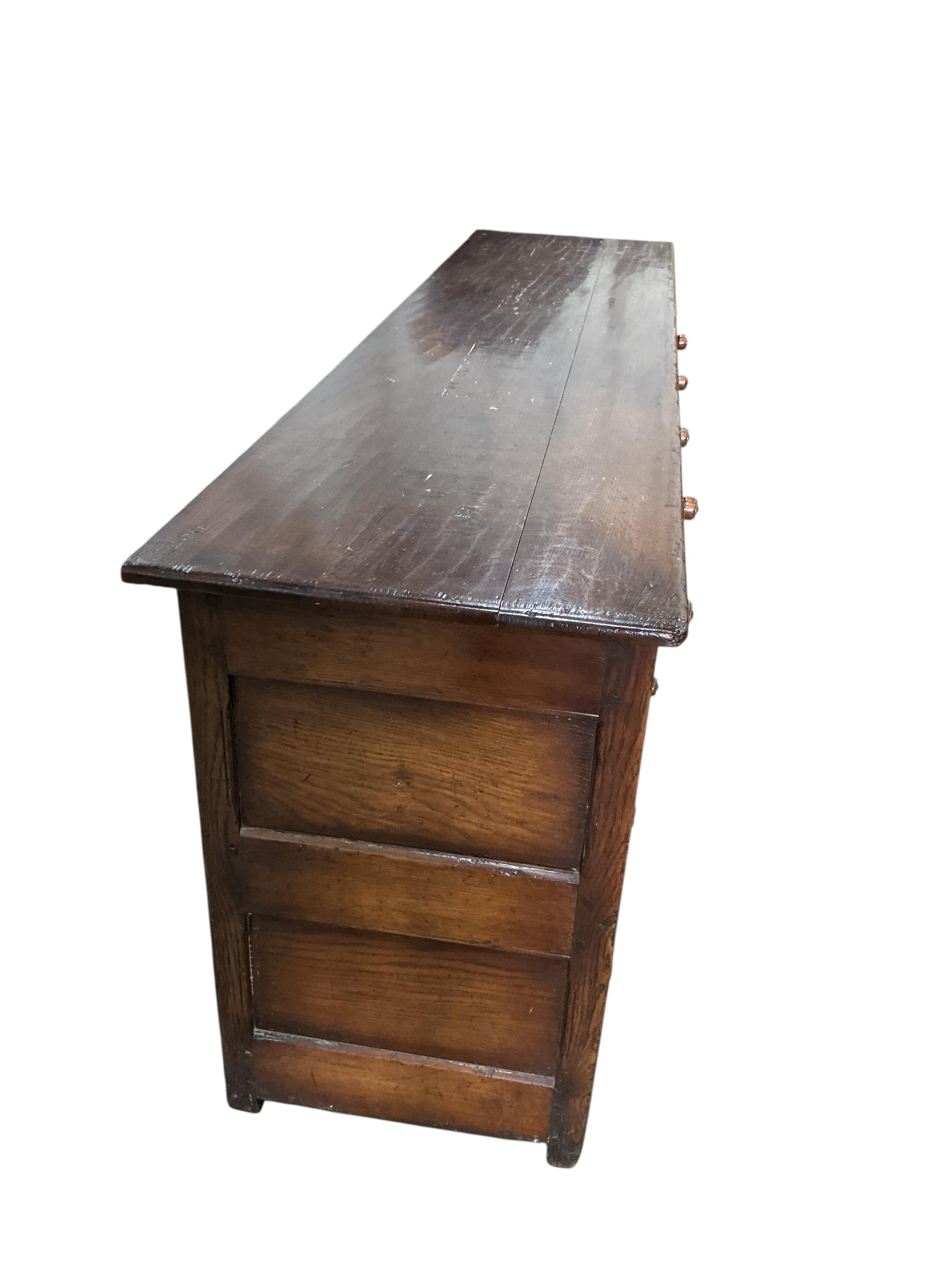 A reproduction 18th century style oak low dresser, width 198cm, depth 48cm, height 76cm